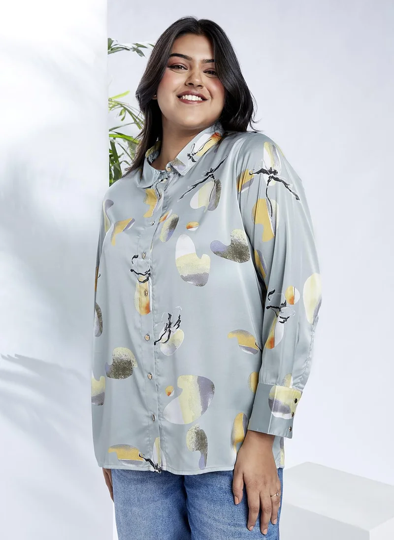 جلو باص بلوزة نسائية جلو بلس مقاس كبير بطبعة تجريدية وأكمام بأساور وياقة